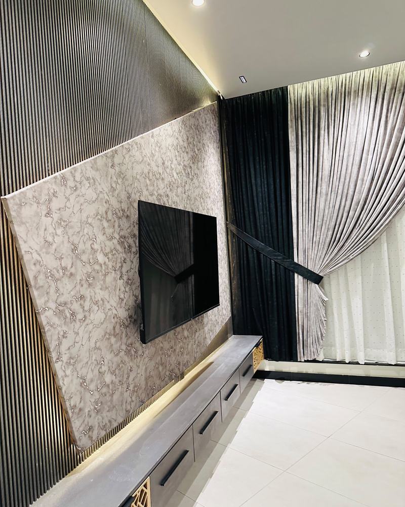 Marble stucco feature wall with television unit