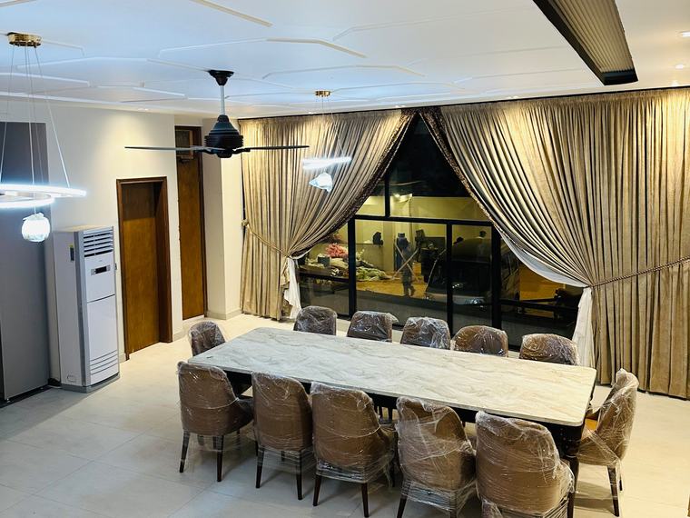 Private dining hall with gold curtains