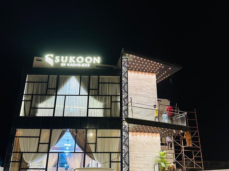 Sukoon by Kababjees restaurant facade at night